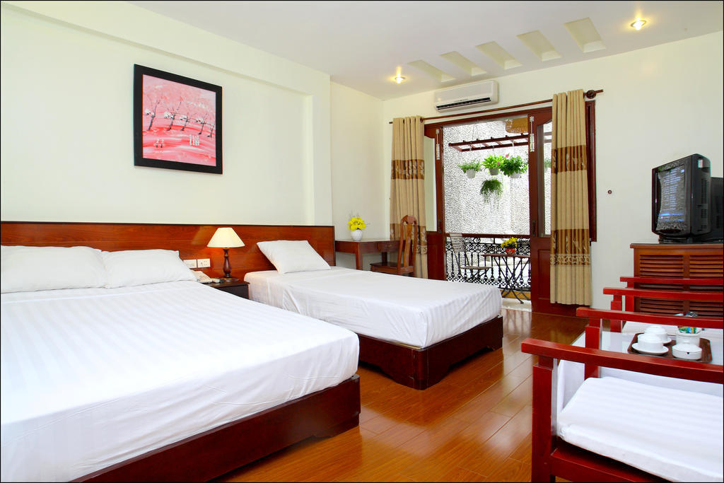 Nhi Trung Hotel Hoi An Rum bild